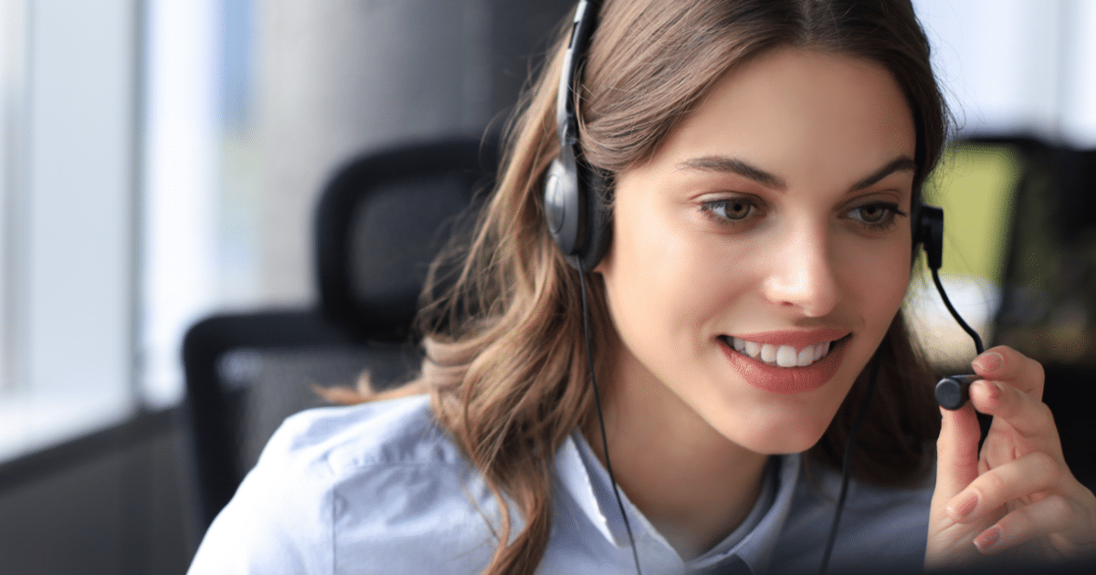 female talking into a headset to qualify a lead