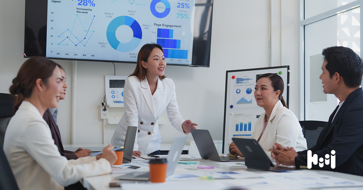 A marketing team gauging how effective is display advertising in a meeting.